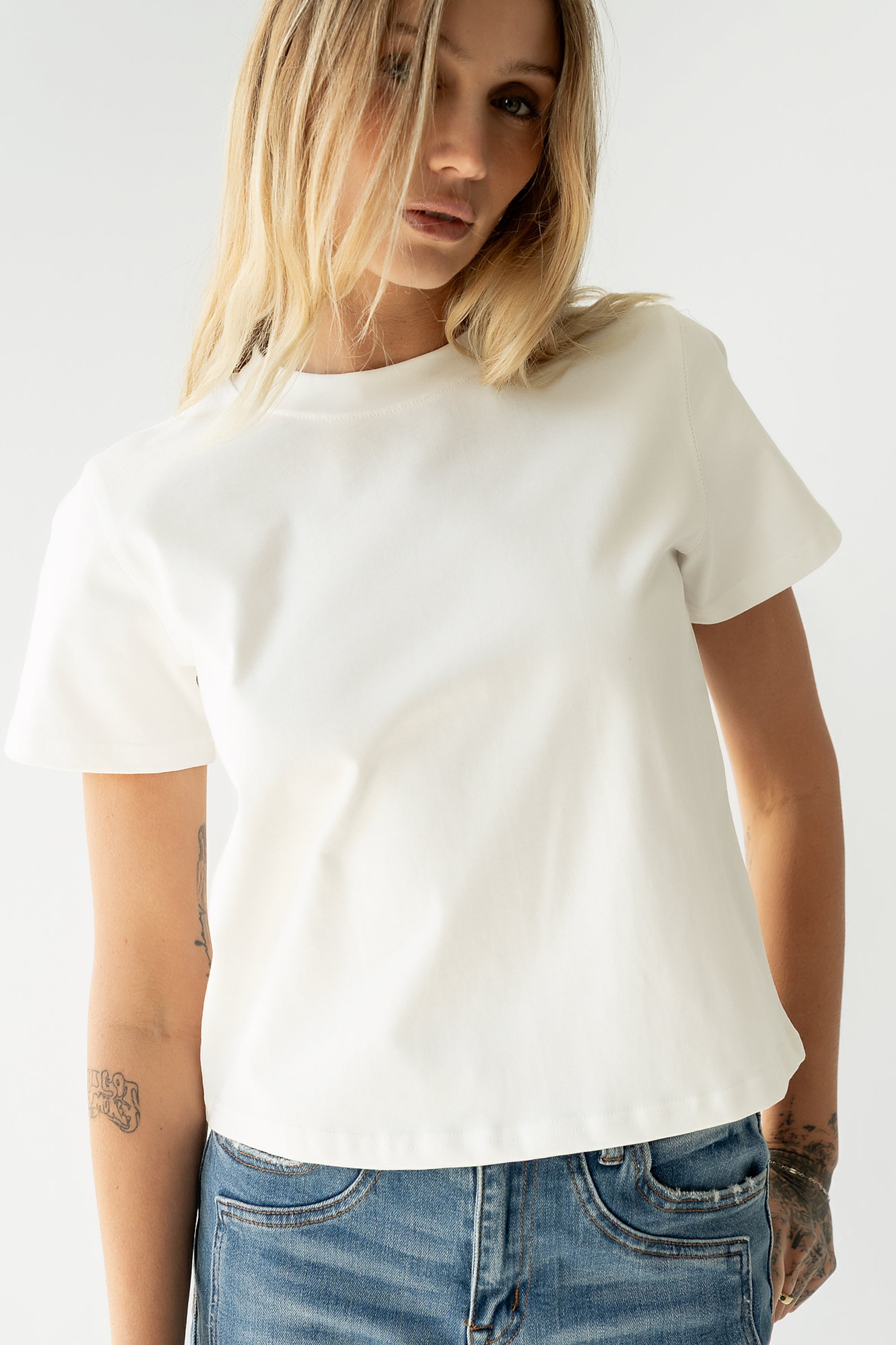Judy Tee in White
